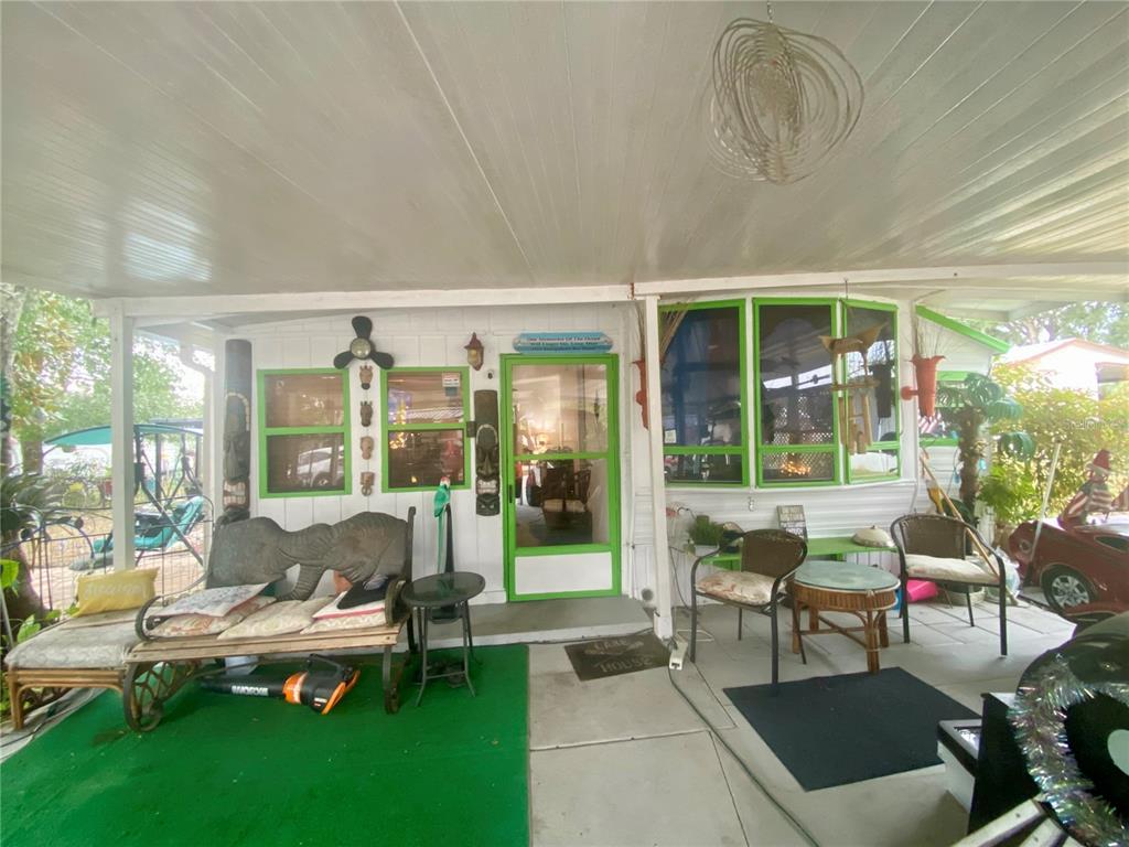 9475 Gray Fox Drive Weeki Wachee, FL 34613 - Photo 2 of 9 a living room with furniture