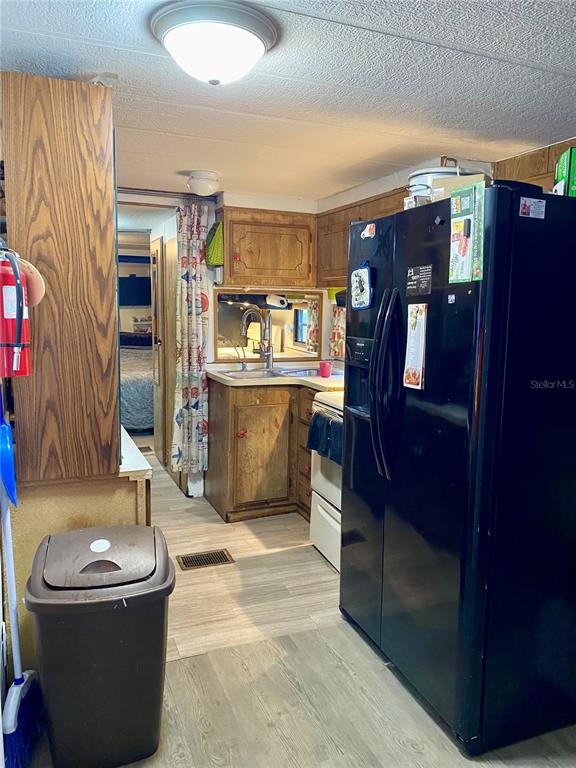 9475 Gray Fox Drive Weeki Wachee, FL 34613 - Photo 4 of 9 a bathroom with a sink and toilet