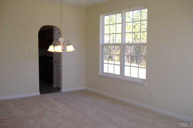 2604 Dutchman Creek Raleigh, NC 27610 - Photo 4 of 7 Formal dining area accented by arched passways Other