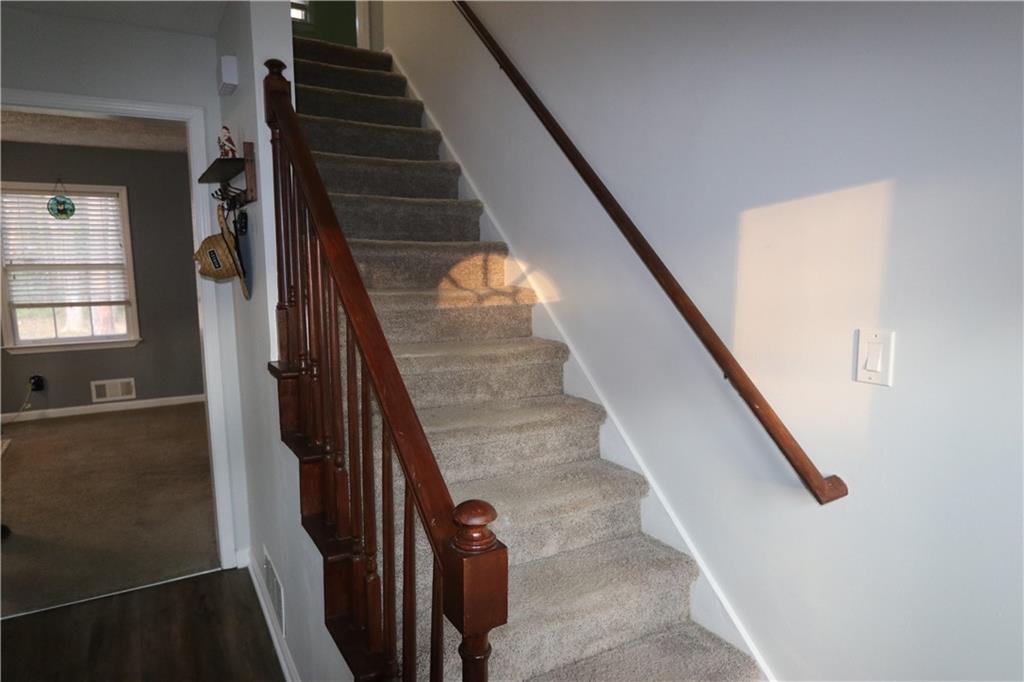 1302 Stephens Street Southwest Lilburn, GA 30047 - Photo 2 of 13 a view of entryway