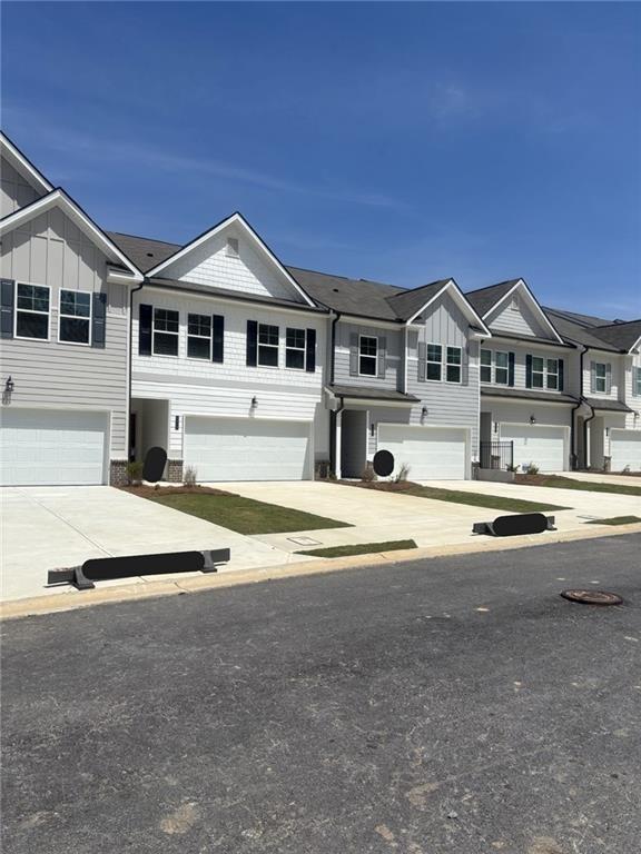 6366 Sundowner Place, Unit 110 Atlanta, GA 30331 - Photo 1 of 1 a view of house with outdoor space and view of a house