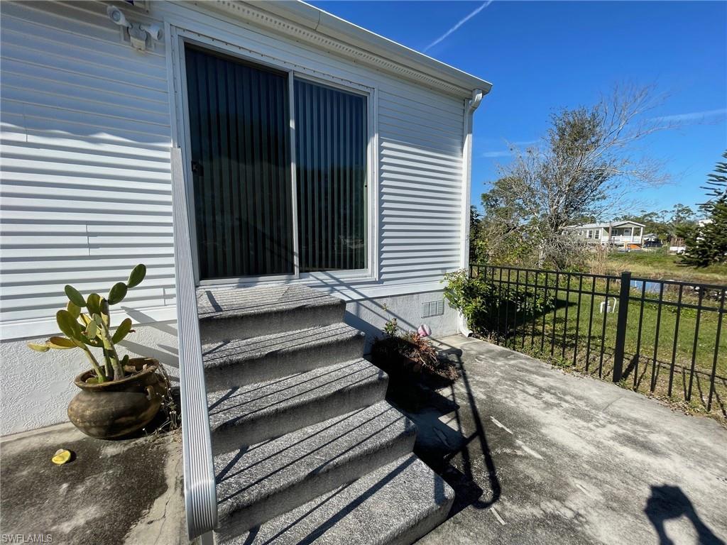11262 Olive Circle Punta Gorda, FL 33955 - Photo 12 of 18 a view of a chair and table in the balcony