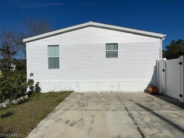 11262 Olive Circle Punta Gorda, FL 33955 - Photo 16 of 18 a view of a house with a backyard