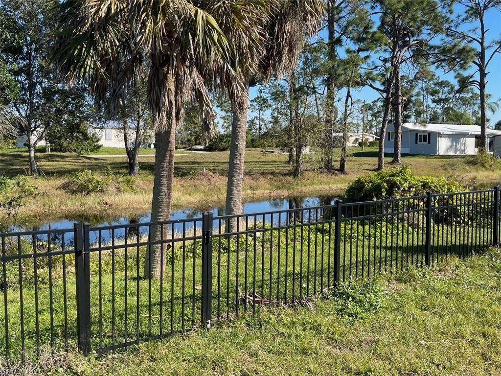 11262 Olive Circle Punta Gorda, FL 33955 - Photo 17 of 18 a view of lake from a garden