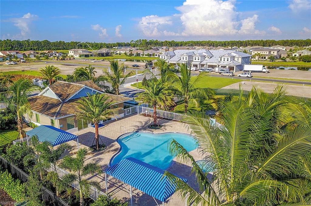 2295 Sawyers Hill Road, Unit 1007 Naples, FL 34120 - Photo 9 of 12 a view of a city and an ocean