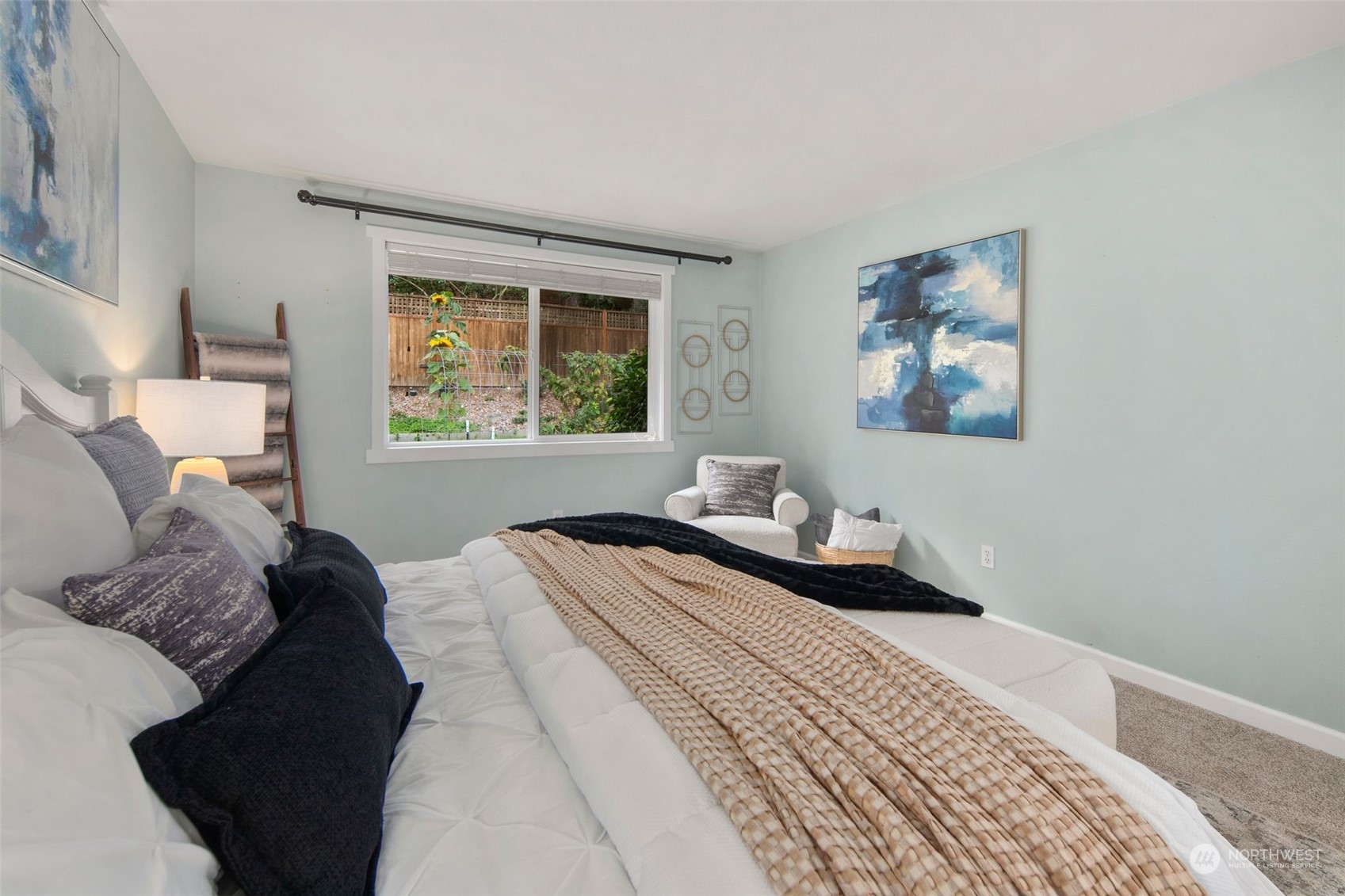 10414 147th Avenue Southeast Renton, WA 98059 - Photo 15 of 40 a bedroom with a bed and a window