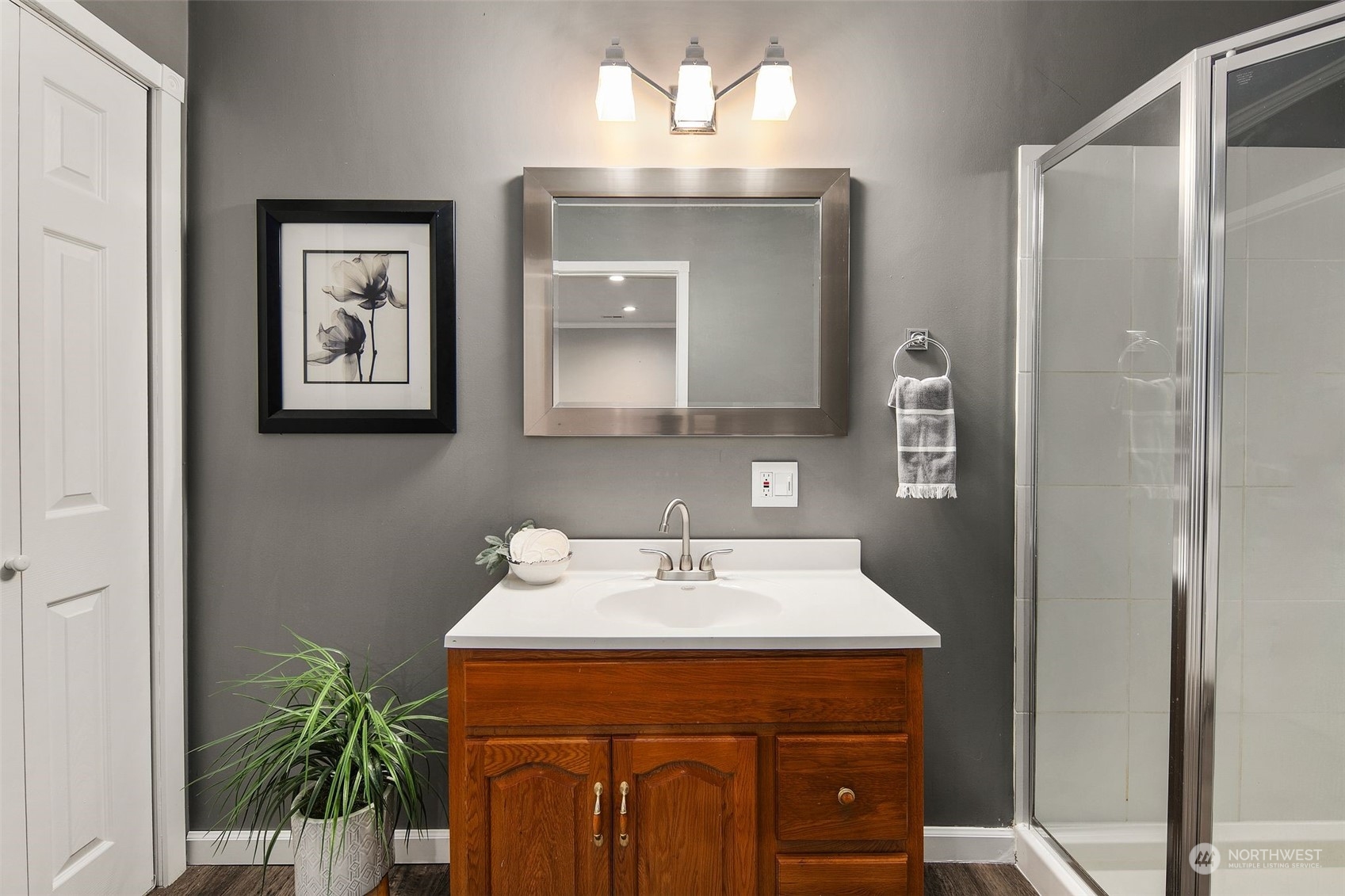 10414 147th Avenue Southeast Renton, WA 98059 - Photo 26 of 40 a bathroom with a sink and a mirror