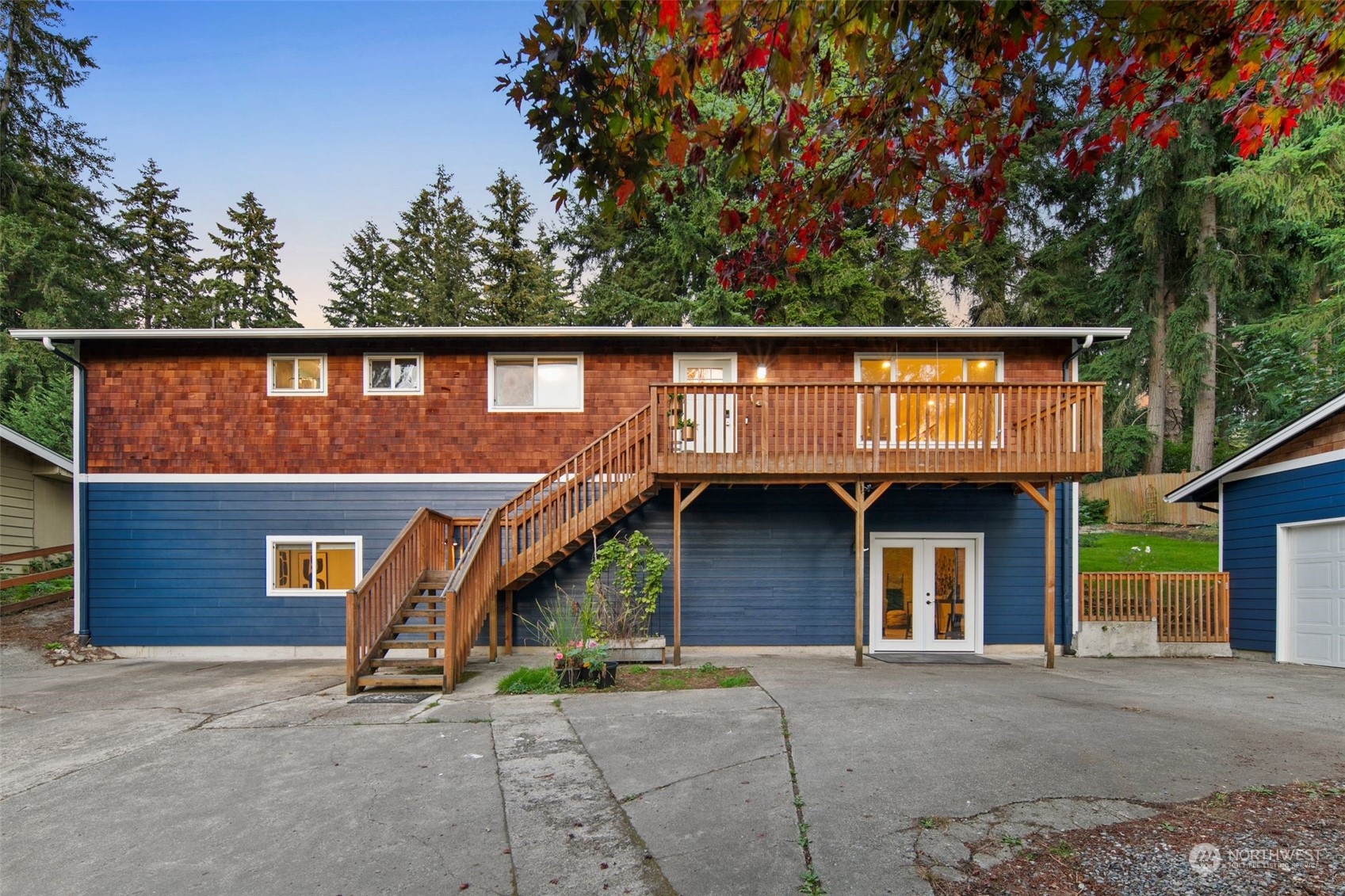 10414 147th Avenue Southeast Renton, WA 98059 - Photo 3 of 40 a front view of a house with garage