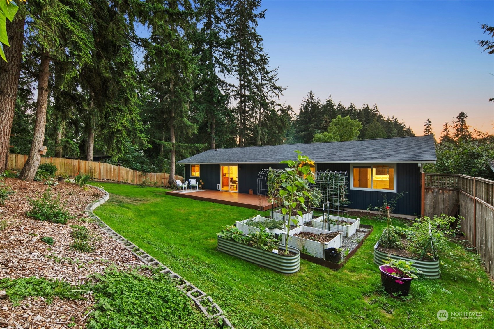 10414 147th Avenue Southeast Renton, WA 98059 - Photo 36 of 40 a front view of a house with garden