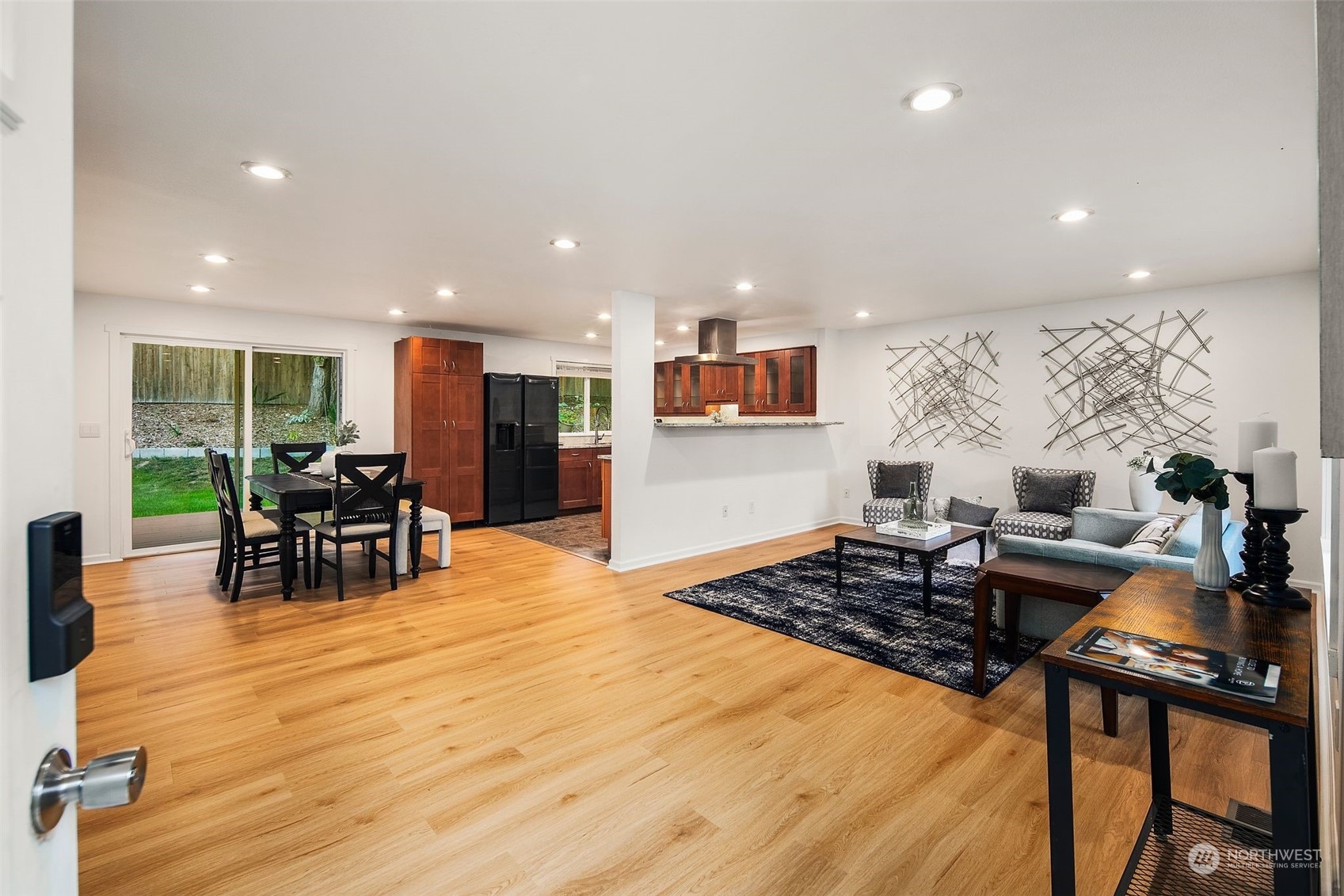 10414 147th Avenue Southeast Renton, WA 98059 - Photo 5 of 40 a living room with furniture and wooden floor