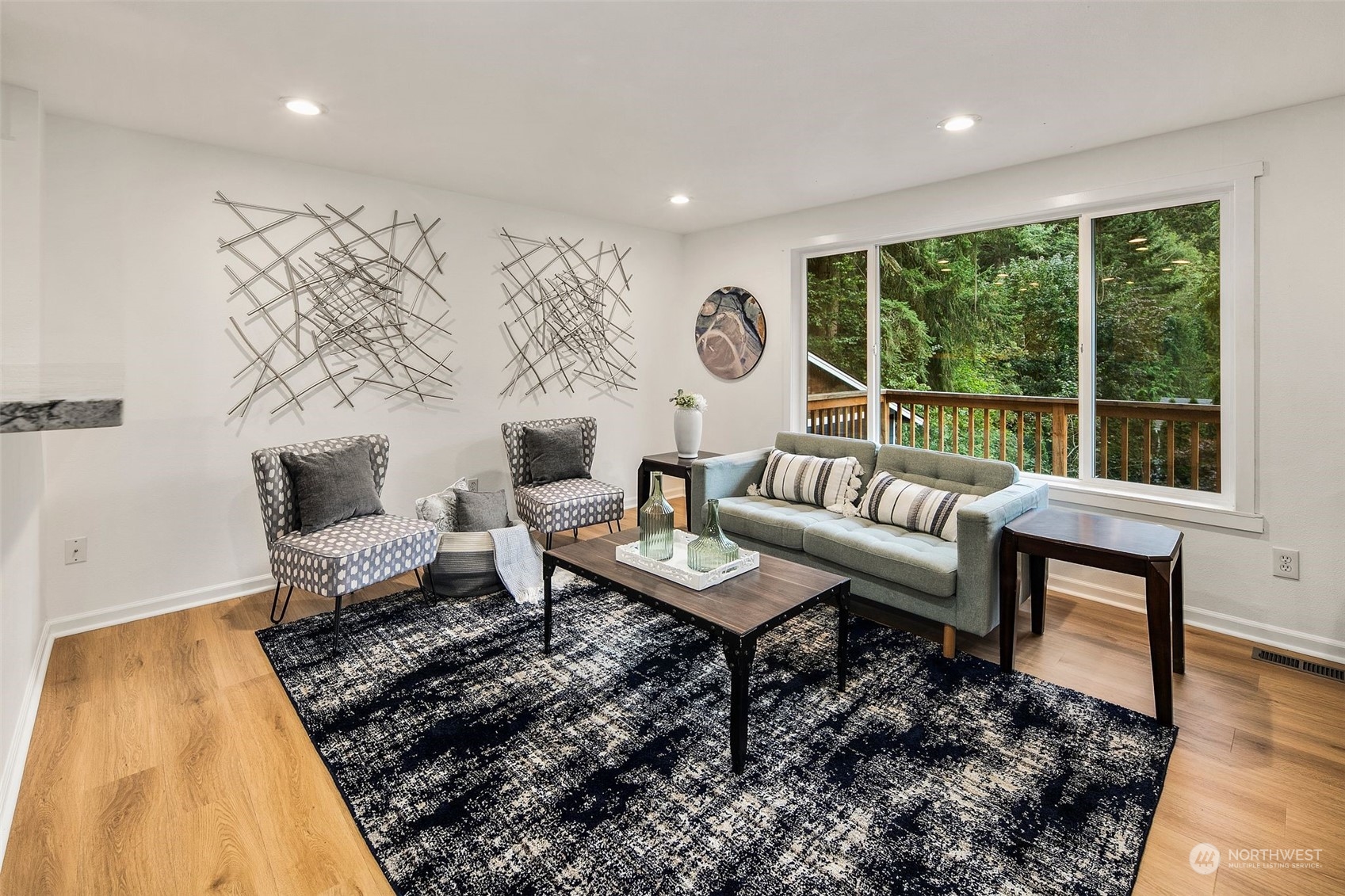 10414 147th Avenue Southeast Renton, WA 98059 - Photo 6 of 40 a living room with furniture and a large window