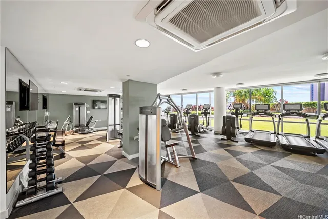 a view of a livingroom with furniture and a rug