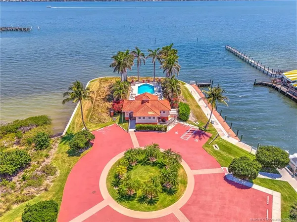 a view of a swimming pool with a patio