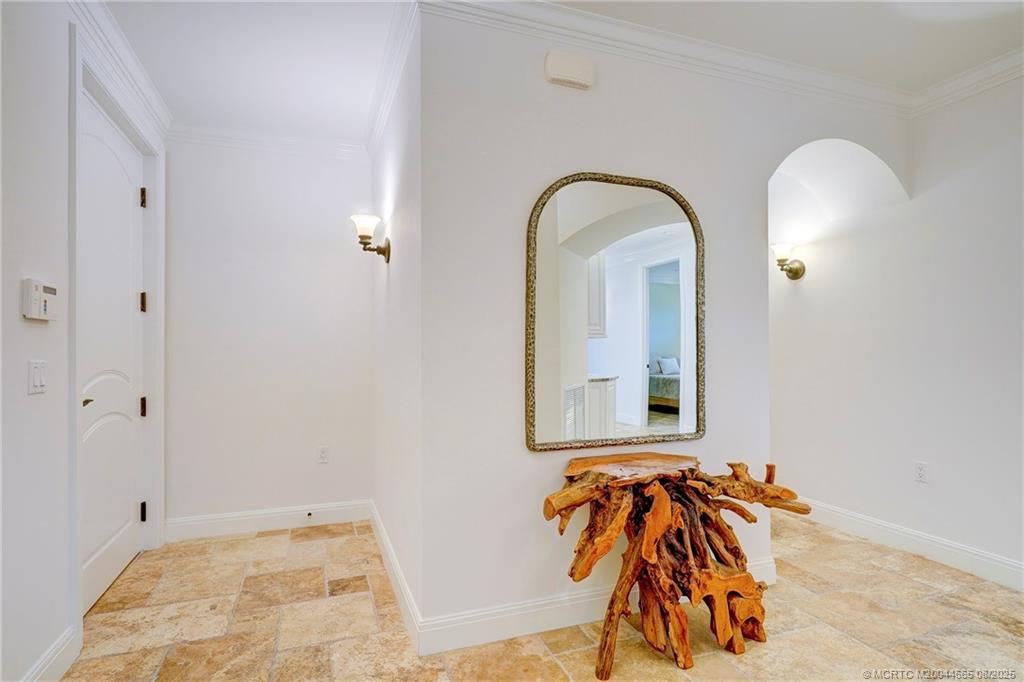 1528 Northeast Outrigger Landings Drive, Unit 208 Jensen Beach, FL 34957 - Photo 15 of 79 a front view of a house with