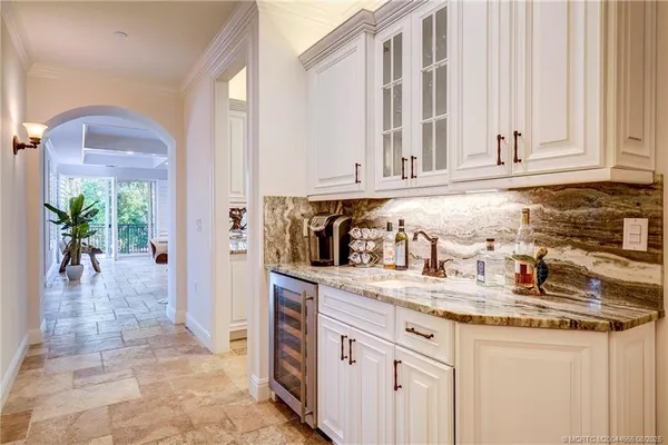 a view of a bathroom from a hallway