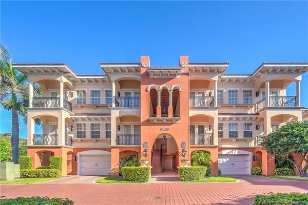 a view of a building with a yard