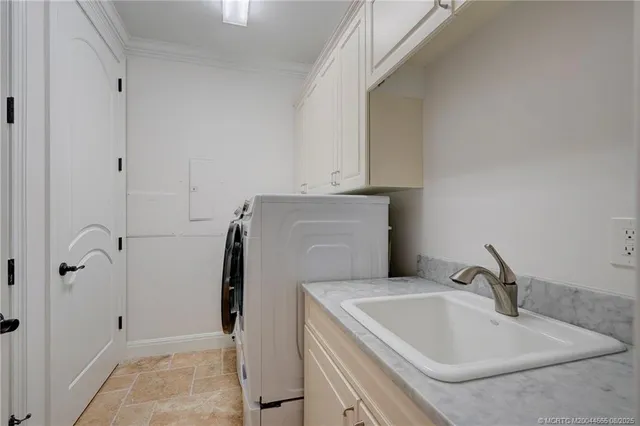 a large bathroom with a large mirror vanity and shower