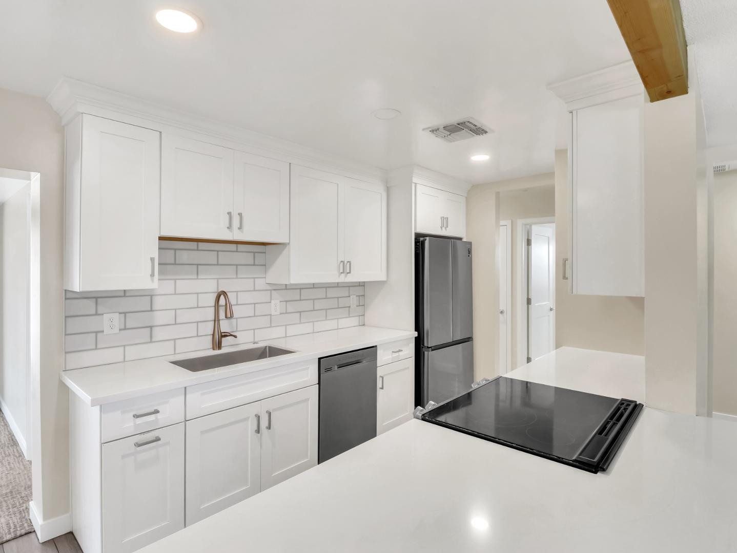 544 West 17th Place Tempe, AZ 85281 - Photo 7 of 38 a kitchen with a sink dishwasher a refrigerator and cabinets
