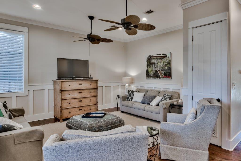 309 Defuniak Street Santa Rosa Beach, FL 32459 - Photo 11 of 53 a living room with furniture and a flat screen tv