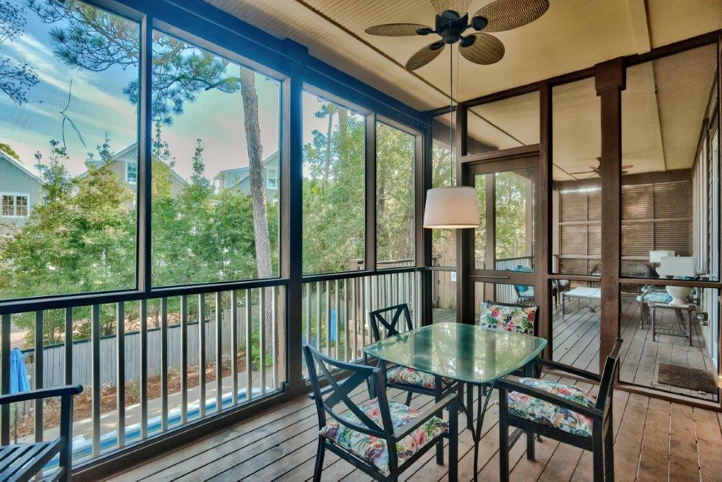 309 Defuniak Street Santa Rosa Beach, FL 32459 - Photo 20 of 53 a view of a dining room with furniture window and outside view