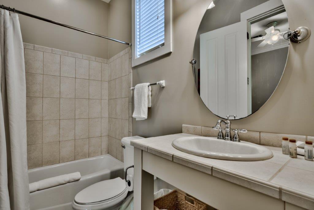 309 Defuniak Street Santa Rosa Beach, FL 32459 - Photo 23 of 53 a bathroom with a sink toilet and shower