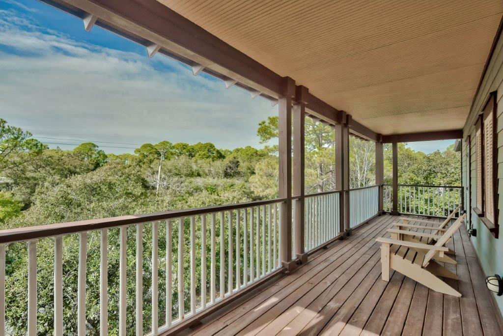 309 Defuniak Street Santa Rosa Beach, FL 32459 - Photo 27 of 53 a view of balcony with wooden floor