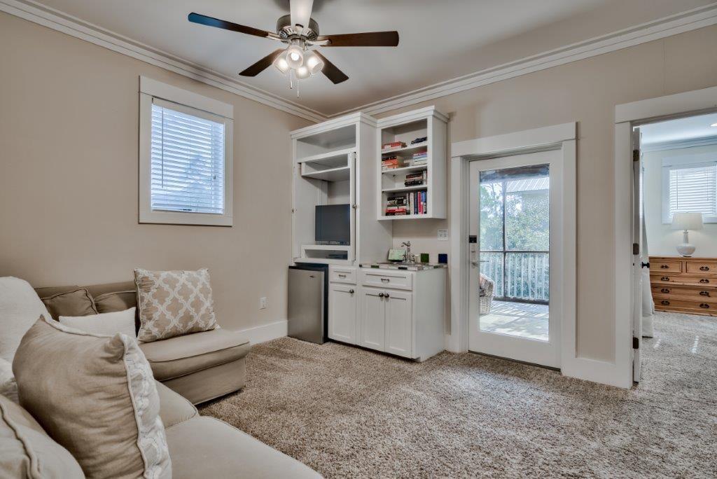 309 Defuniak Street Santa Rosa Beach, FL 32459 - Photo 28 of 53 a living room with furniture and decor