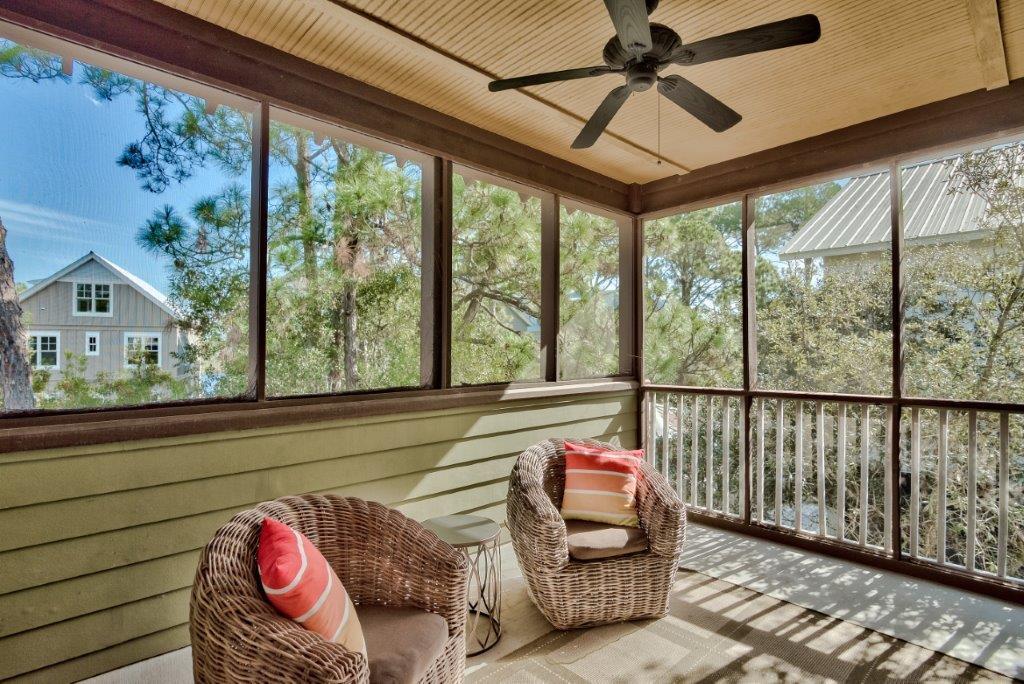 309 Defuniak Street Santa Rosa Beach, FL 32459 - Photo 34 of 53 a living room with large windows