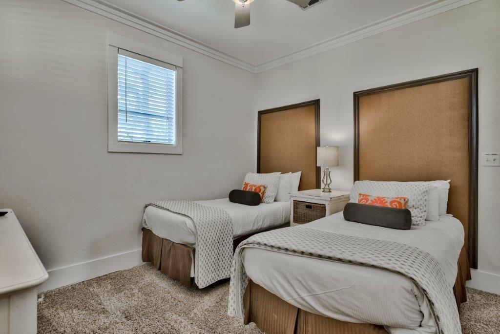 309 Defuniak Street Santa Rosa Beach, FL 32459 - Photo 35 of 53 a bedroom with two beds and painting on the wall