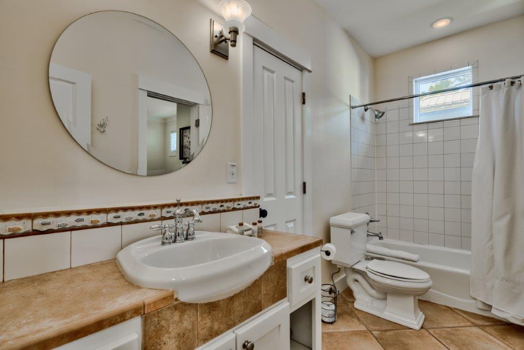 309 Defuniak Street Santa Rosa Beach, FL 32459 - Photo 37 of 53 a bathroom with a sink toilet and shower