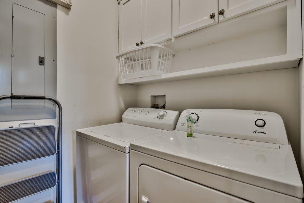 309 Defuniak Street Santa Rosa Beach, FL 32459 - Photo 41 of 53 a utility room with dryer and washer