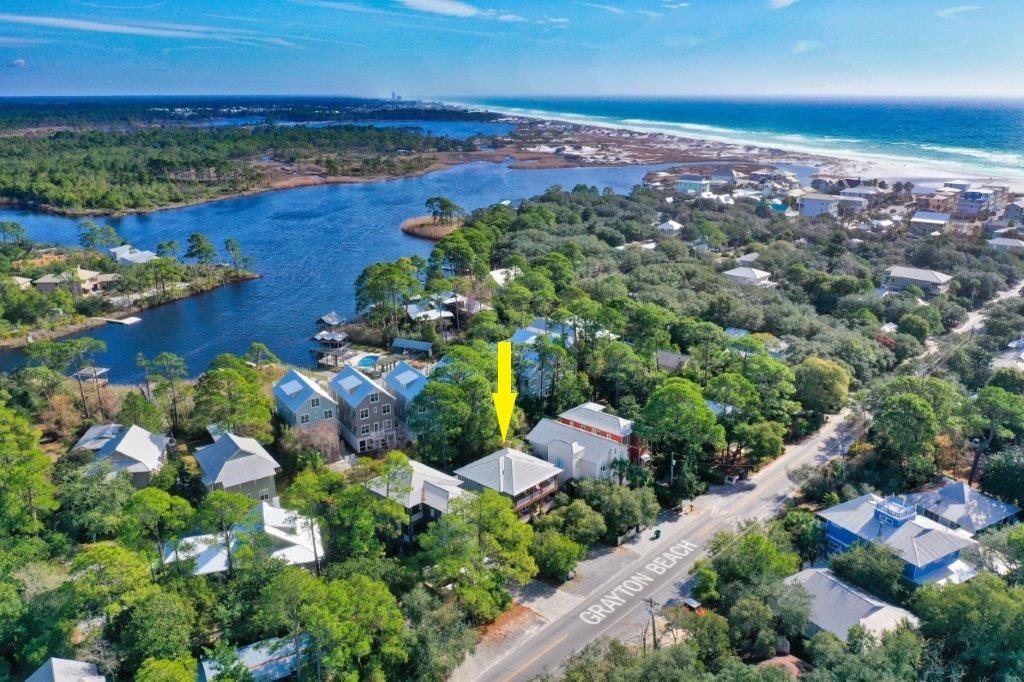 309 Defuniak Street Santa Rosa Beach, FL 32459 - Photo 46 of 53 an aerial view of a houses with a yard