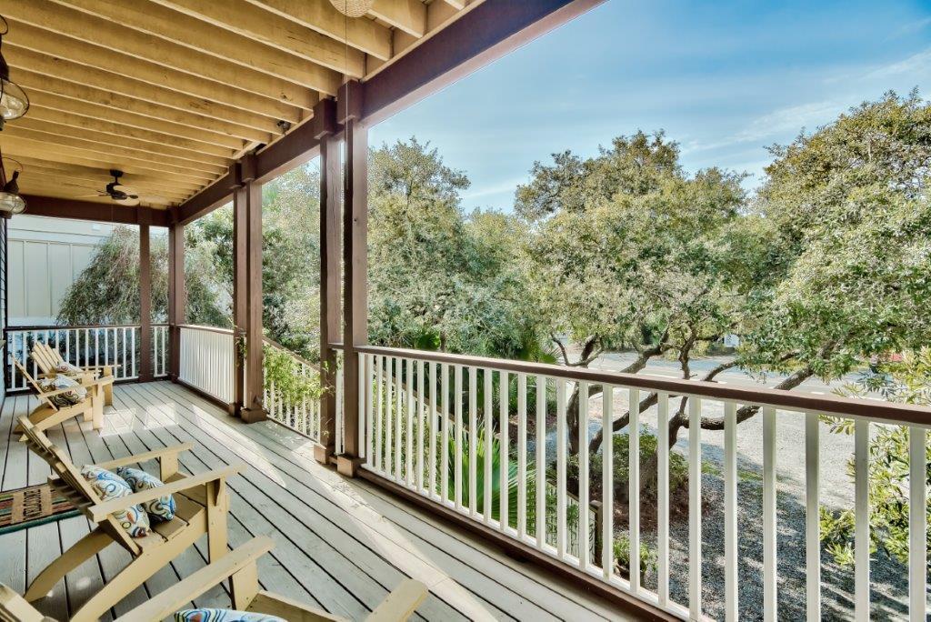 309 Defuniak Street Santa Rosa Beach, FL 32459 - Photo 8 of 53 a view of a balcony with furniture