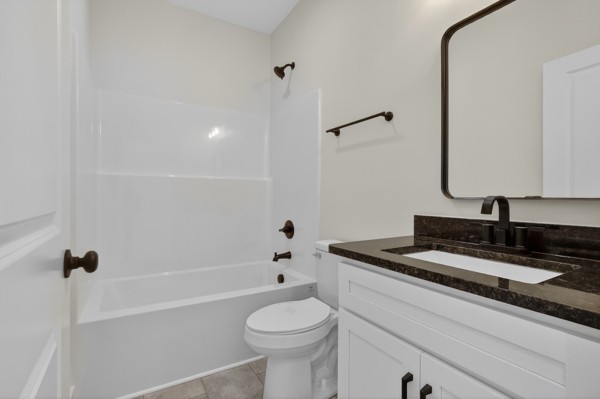 1233 Coleytown Road Lafayette, TN 37083 - Photo 29 of 39 a bathroom with a sink a toilet and a bathtub