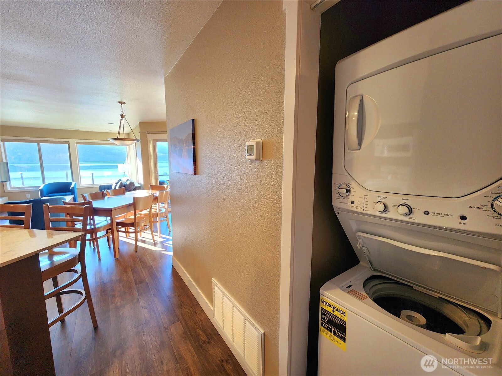 1 Lakeside 709-o Manson, WA 98831 - Photo 14 of 39 a living room with furniture and wooden floor