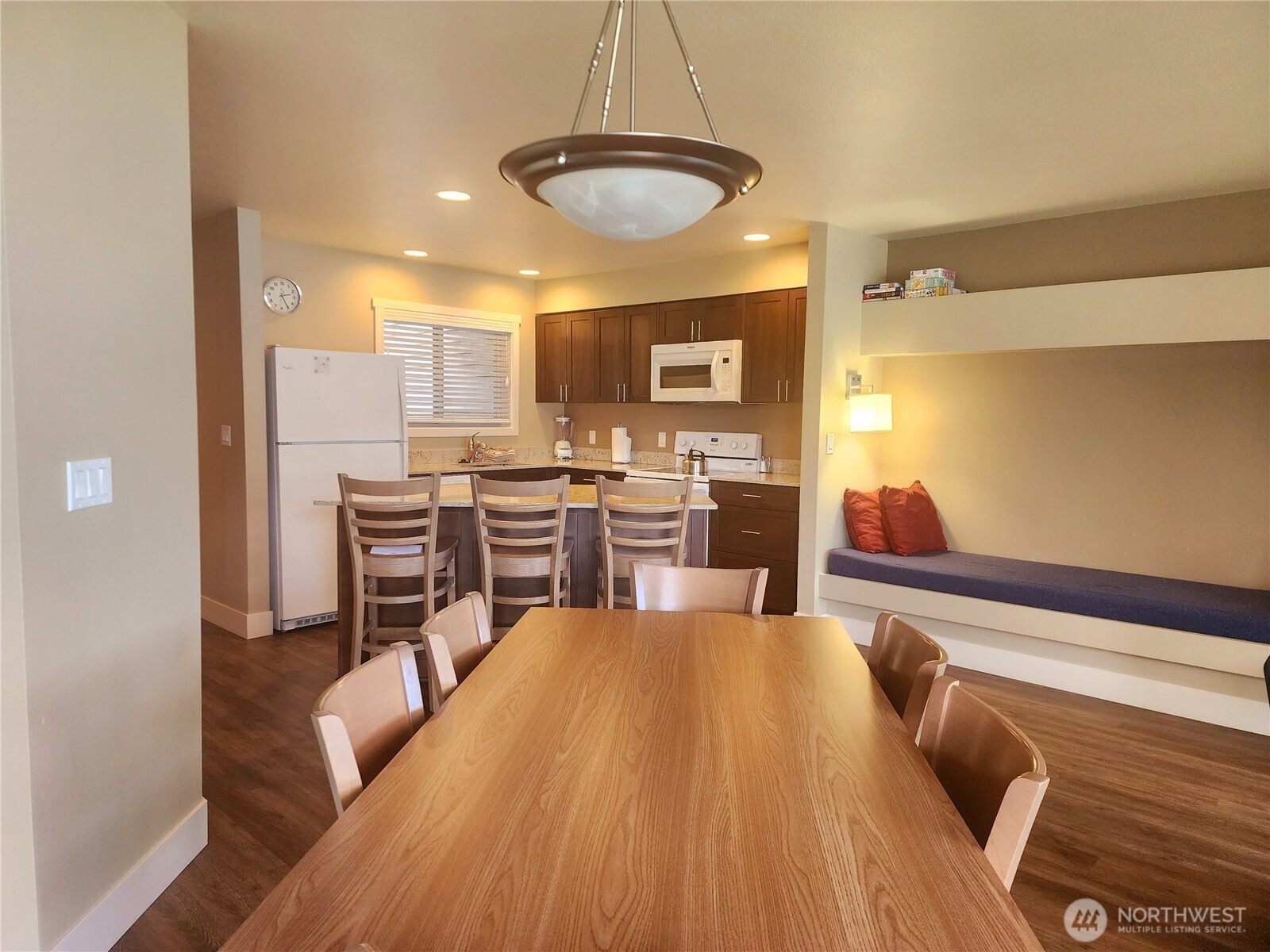 1 Lakeside 709-o Manson, WA 98831 - Photo 9 of 39 a large kitchen with a table and chairs