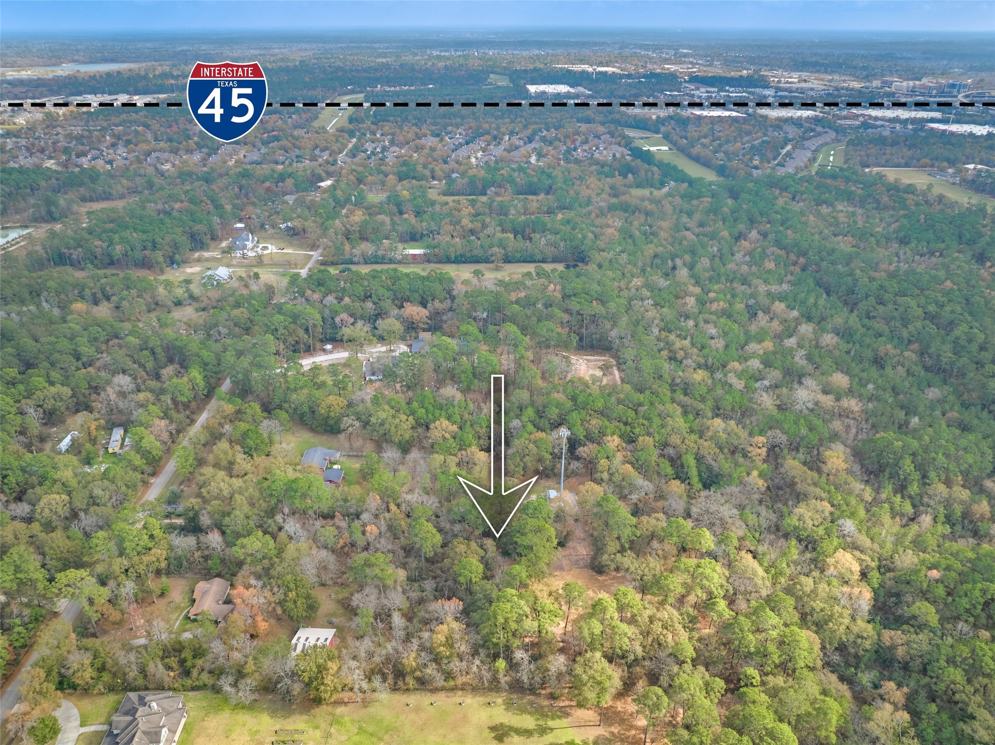 3027 Pine Acres Drive Conroe, TX 77384 - Photo 12 of 14 Quiet lot with easy access to I-45 - just a few quick turns away!