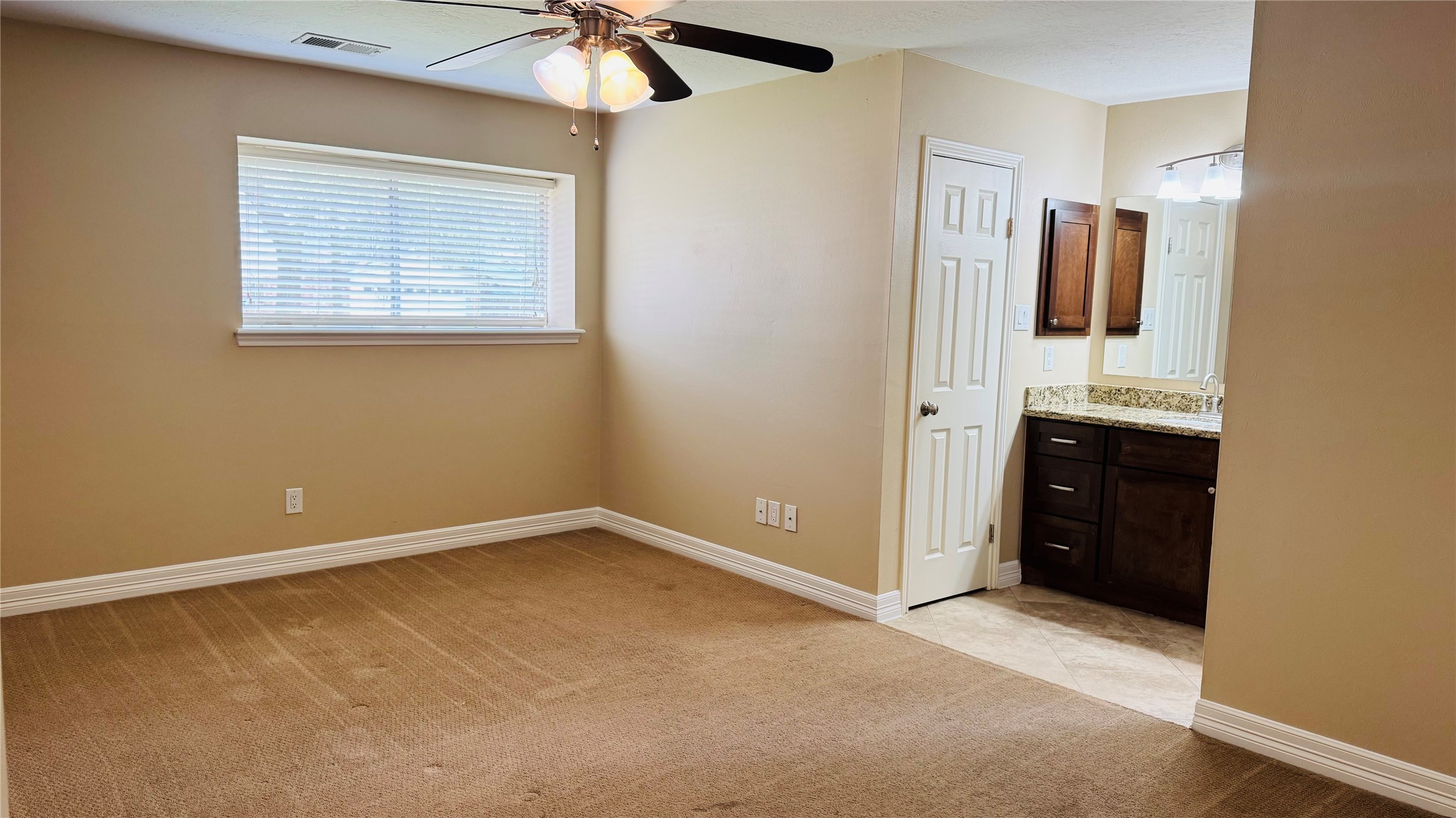 3310 Glen Spring Drive Houston, TX 77339 - Photo 12 of 18 an empty room with a bathroom