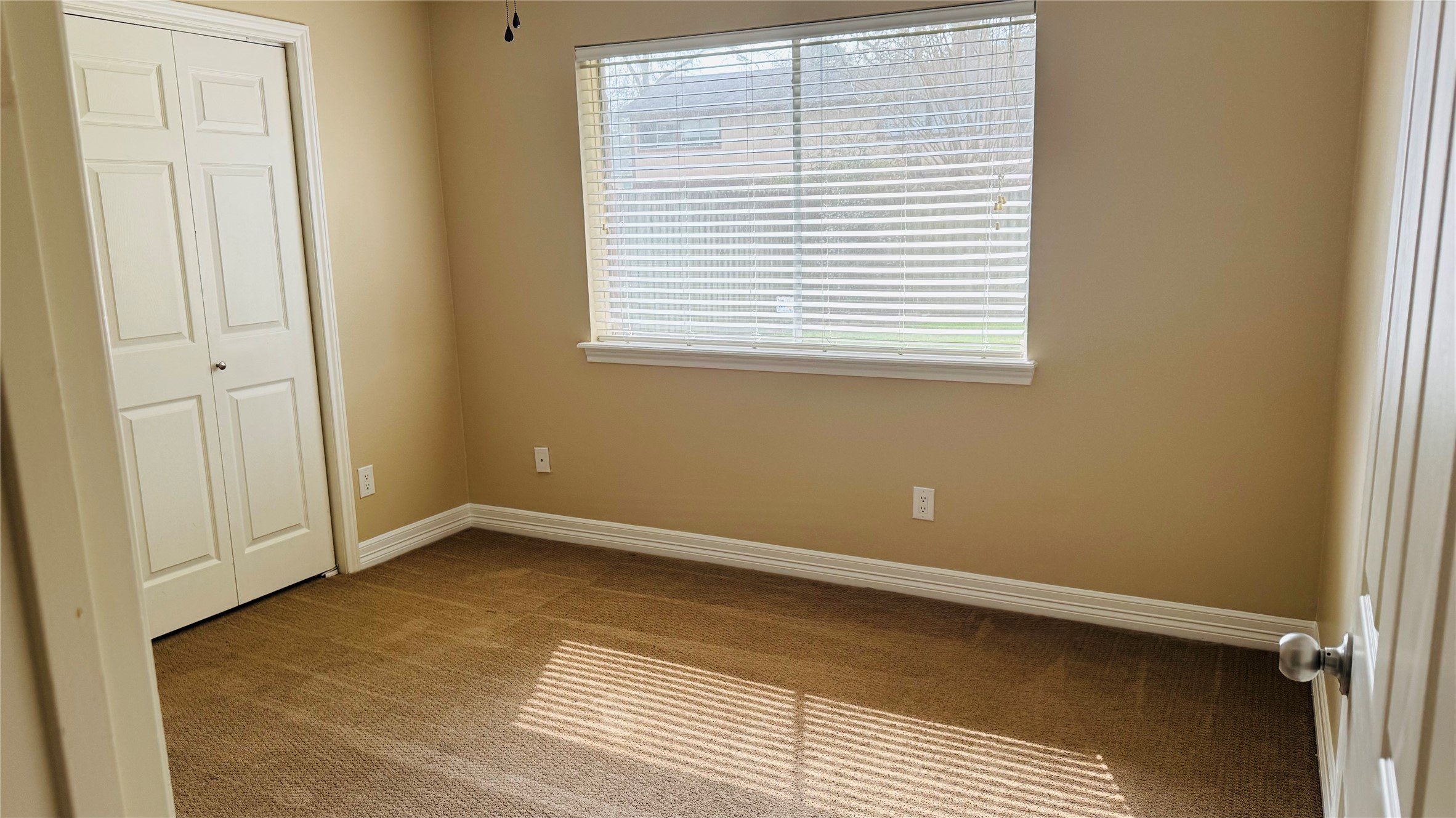 3310 Glen Spring Drive Houston, TX 77339 - Photo 15 of 18 an empty room with a window