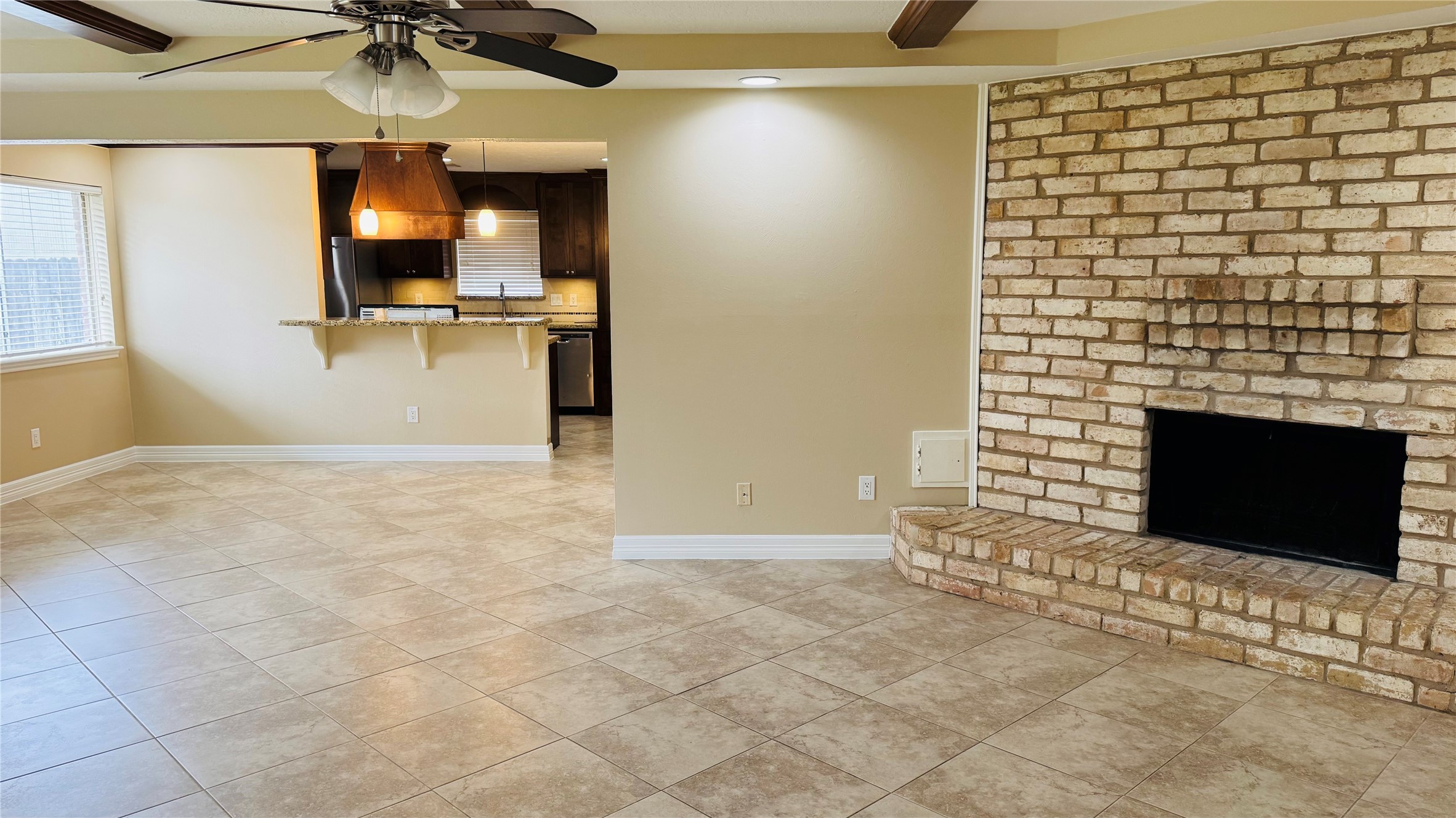 3310 Glen Spring Drive Houston, TX 77339 - Photo 8 of 18 a view of a livingroom with a fireplace and furniture
