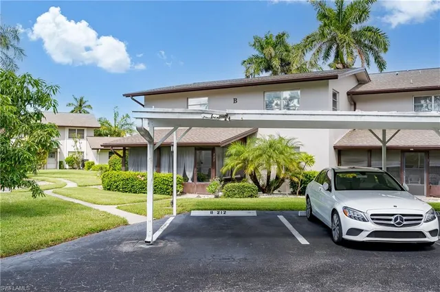 a car parked in front of a house