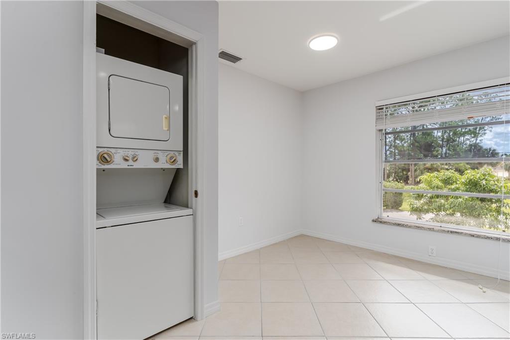 180 Cypress Way East, Unit B212 Naples, FL 34110 - Photo 10 of 40 a view of a storage & utility room with a sink