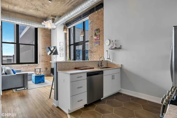 a kitchen with a stove and a sink