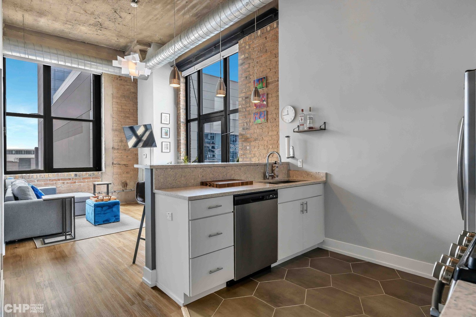 320 East 21st Street, Unit 617 Chicago, IL 60616 - Photo 6 of 23 a kitchen with a stove and a sink