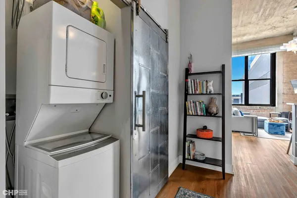 a storage room with washer and dryer