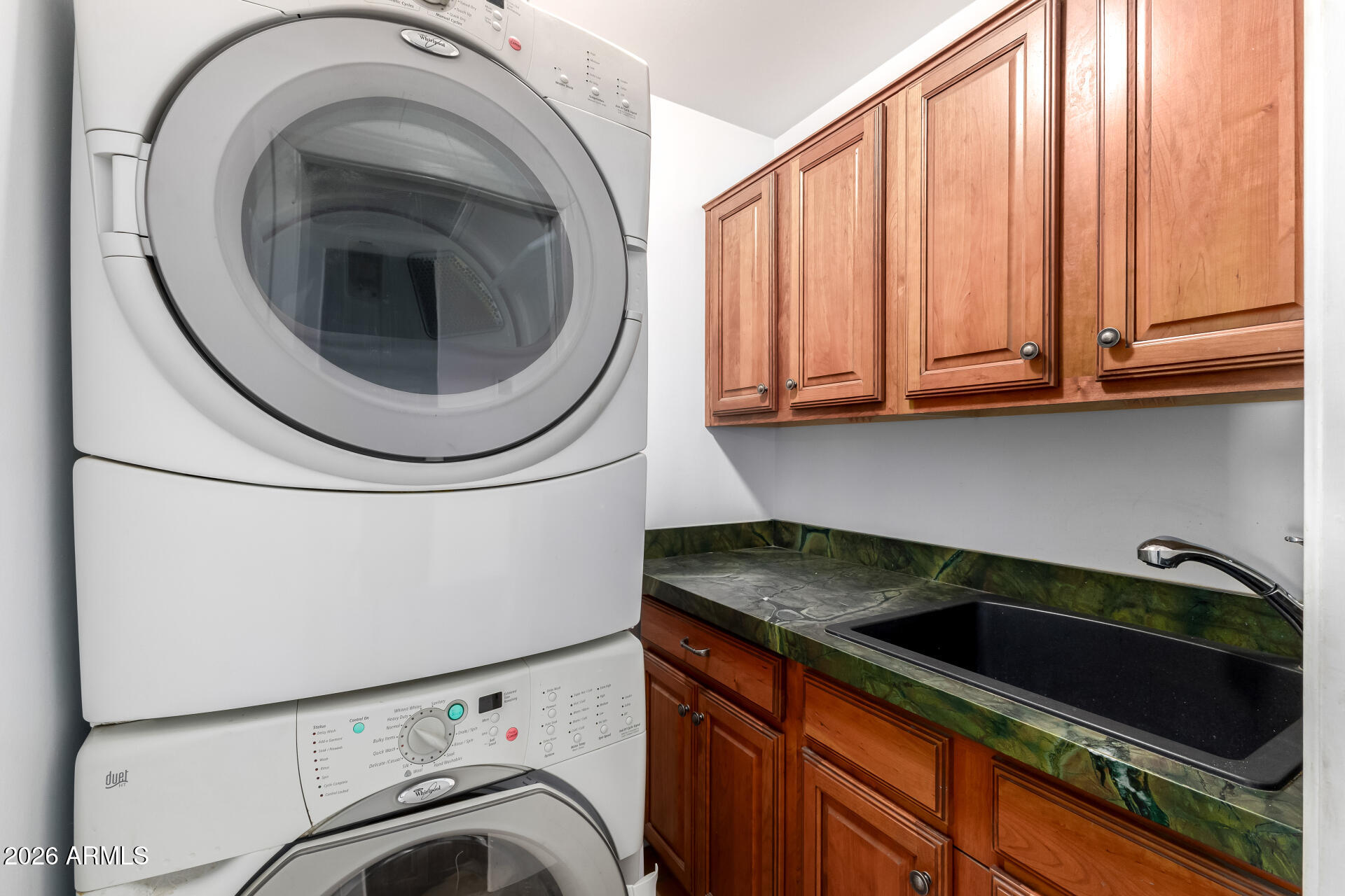 9012 South 47th Place Phoenix, AZ 85044 - Photo 43 of 54 a utility room with dryer and washer