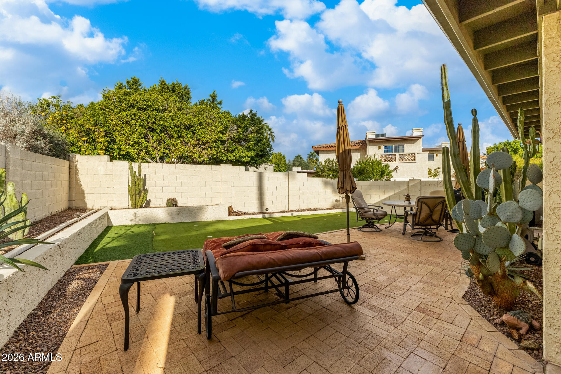 9012 South 47th Place Phoenix, AZ 85044 - Photo 46 of 54 a view of outdoor space yard deck patio and outdoor seating