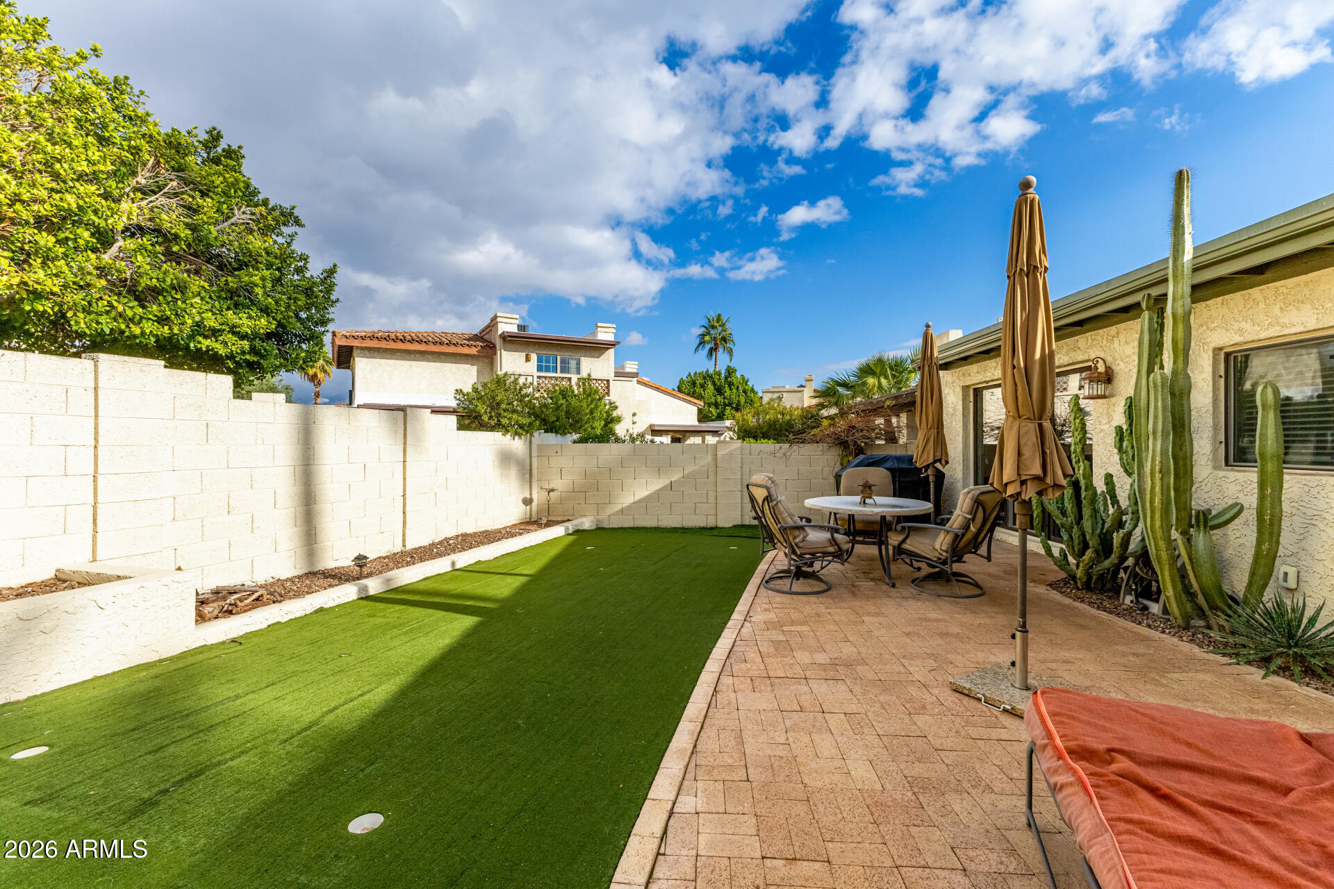 9012 South 47th Place Phoenix, AZ 85044 - Photo 47 of 54 a view of yard with patio