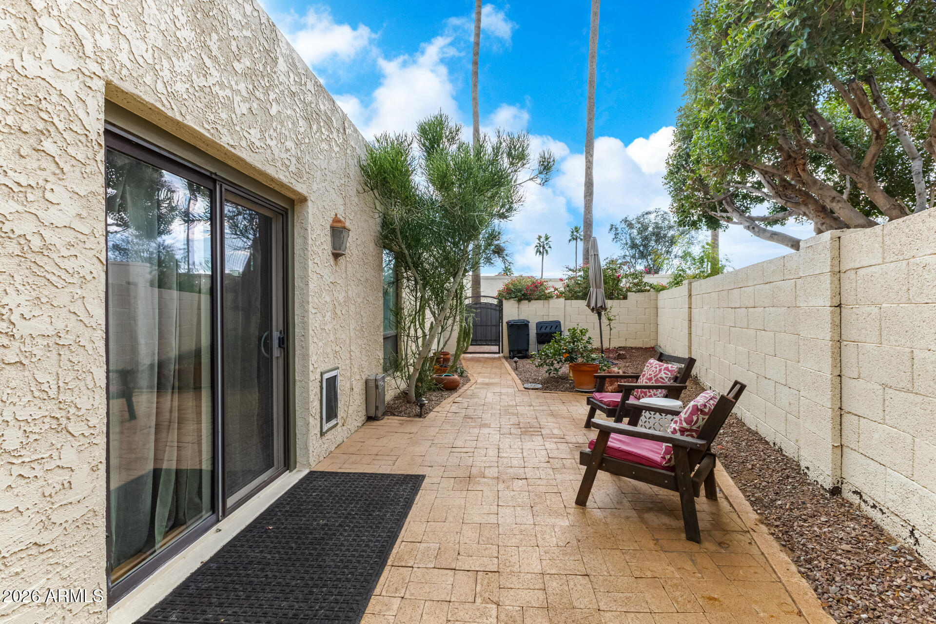 9012 South 47th Place Phoenix, AZ 85044 - Photo 54 of 54 a view of house with outdoor seating space