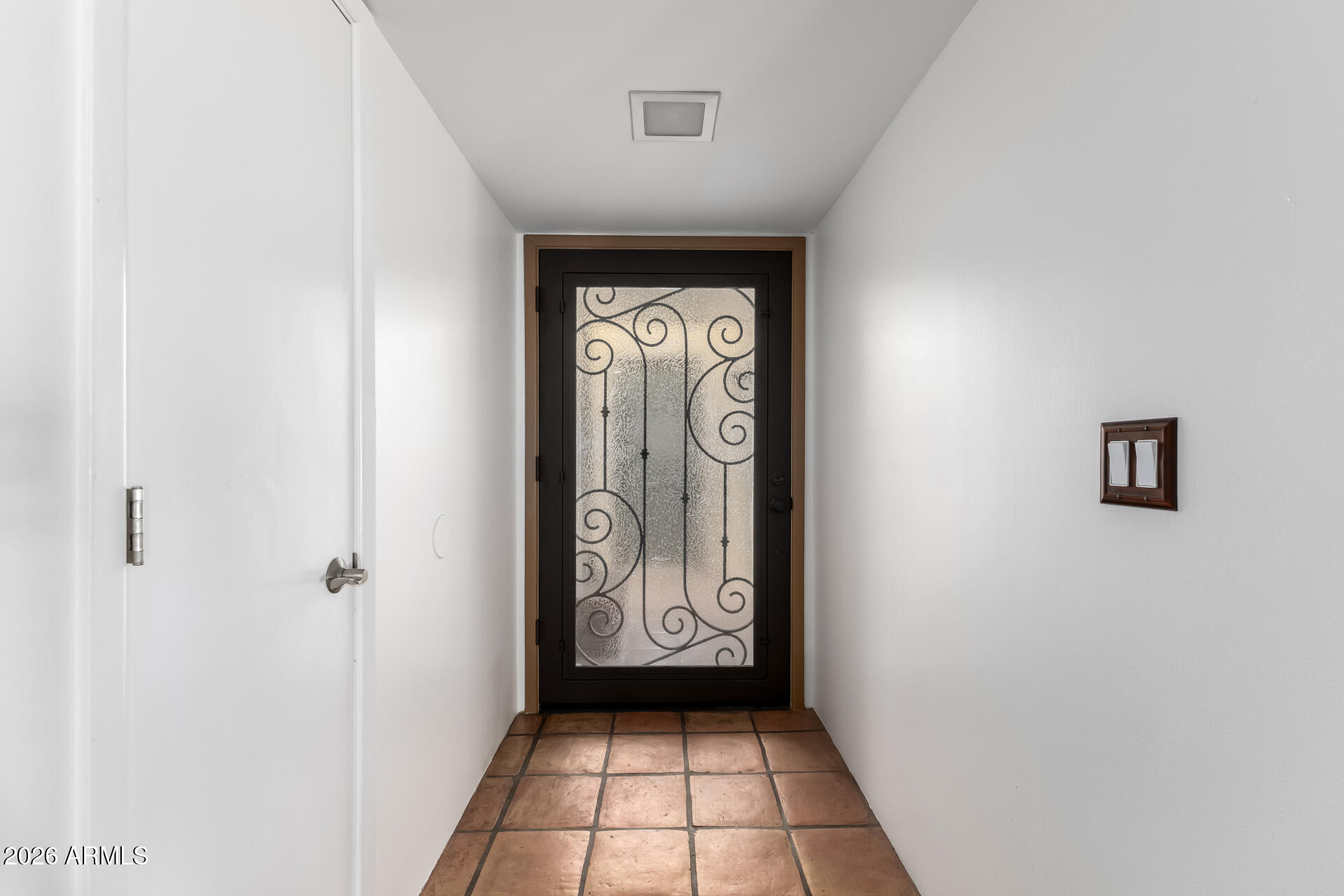 9012 South 47th Place Phoenix, AZ 85044 - Photo 7 of 54 a view of a hallway with a window
